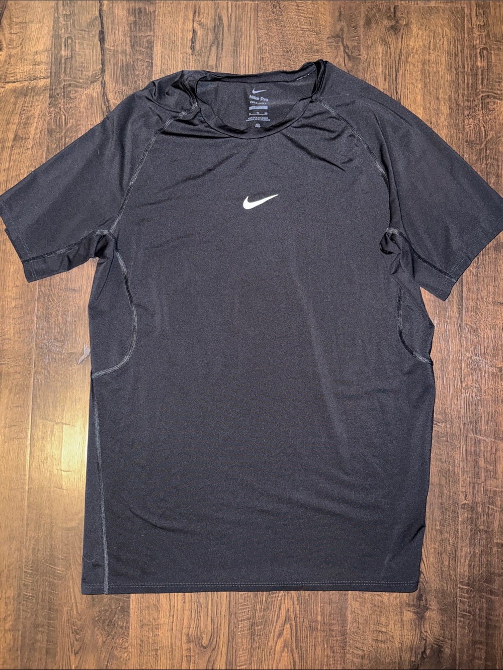 Nike Black Short Sleeve Dri-FIT Athletic Tee with White Swoosh